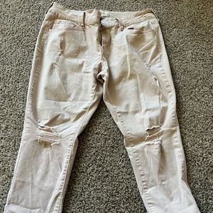 Light pink distressed stretchy jeans